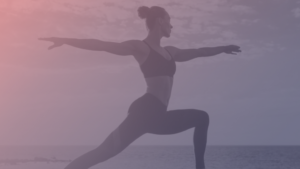 woman doing yoga on the beach